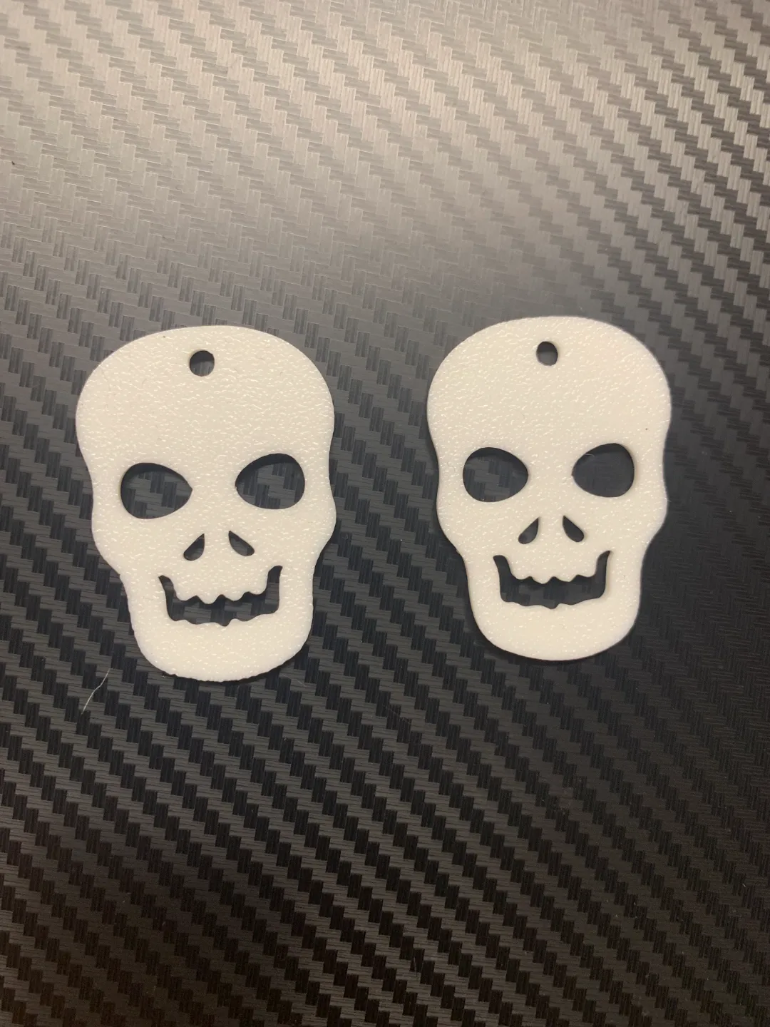 skull earrings view 2