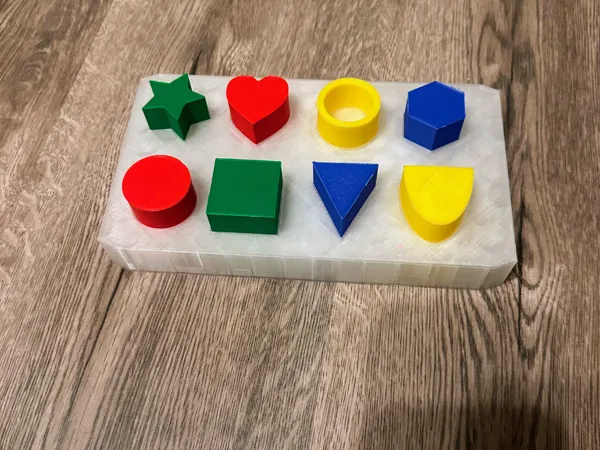 Jeu d'encastrement Montessori — formes géométriques