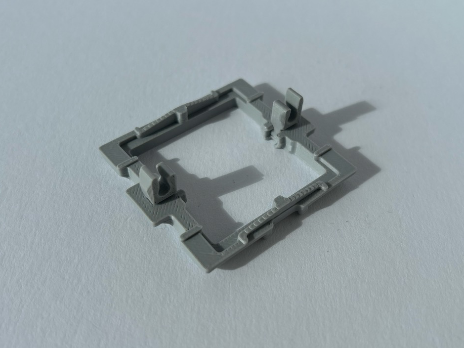 Holding bracket for Gira E2 switch