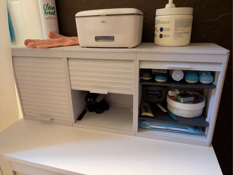 2/3 bay cabinet with tambour doors and adj shelves