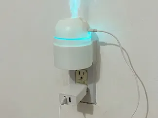 Suporte de tomada para humidificador