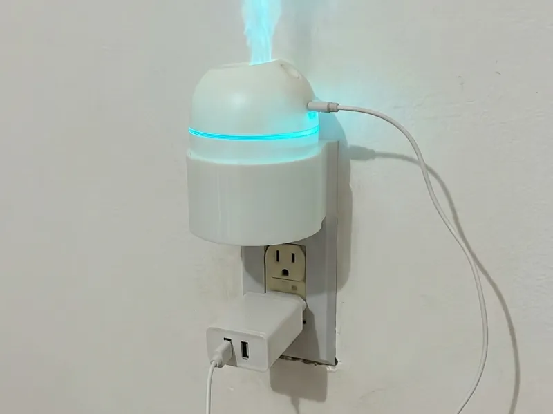 Suporte de tomada para humidificador