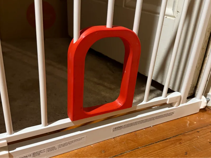 Cat opening for baby gate
