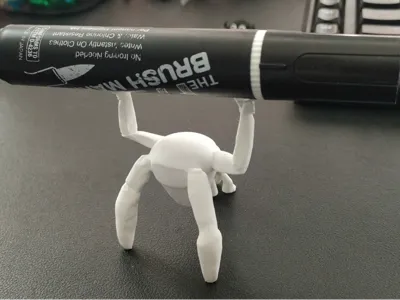 Rocky holds a pen