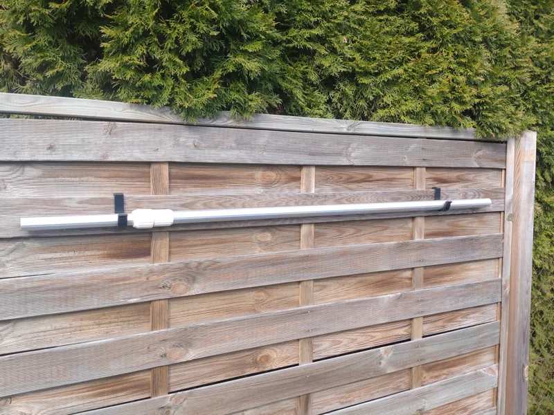 Rounded hook for wood privacy fence