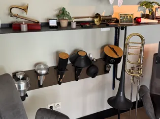 Modular mute holders for bass trombone mutes