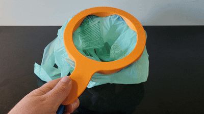 Twist to Release Cat Litter or Trash Bag Holder