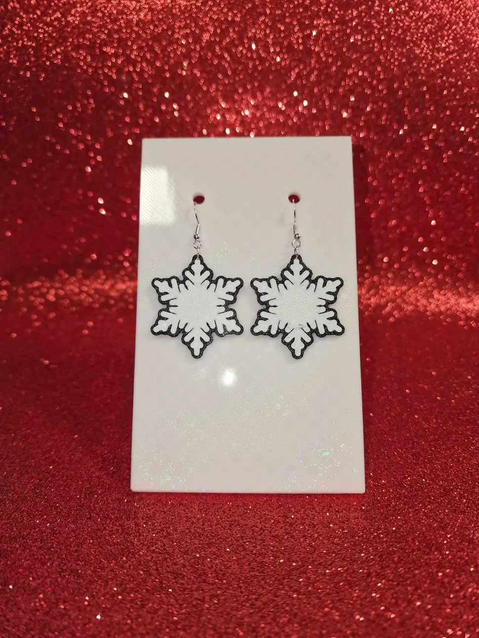 Black and white snowflake earrings view 2