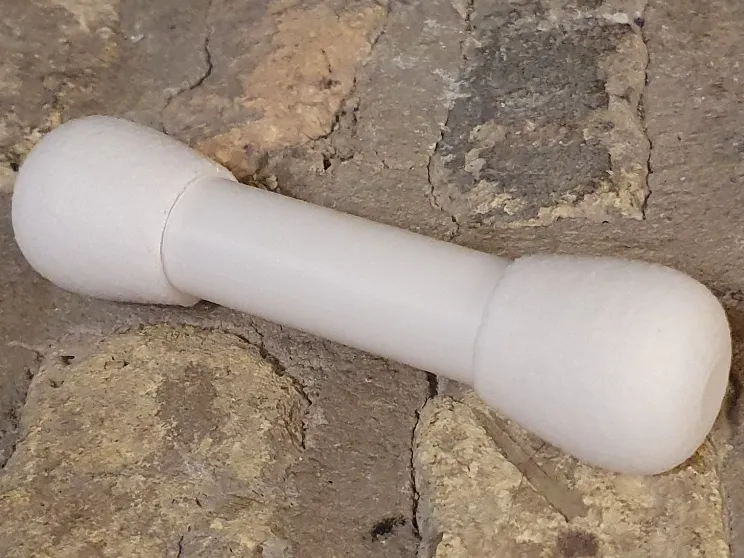 Q-Tip shaped storage container