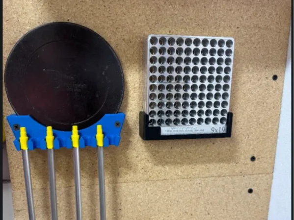 Dillon Primer flip tray and tube wall mount