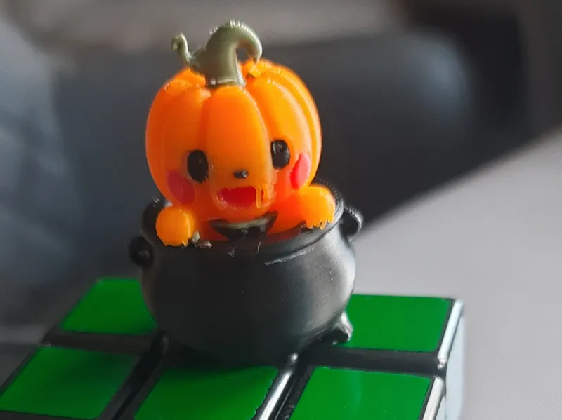 Baby Pumpkin In Cauldron