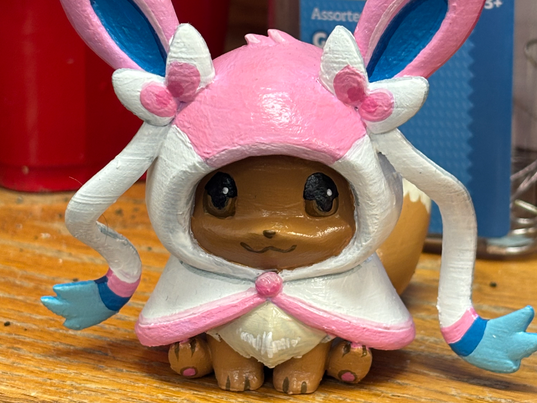 Eevee Chibi con Mantellino di Sylveon Pokemon