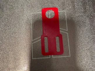 Pieza para colgar perchas