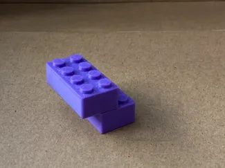 Leg-o 2x4 brick (Works with normal bricks!)