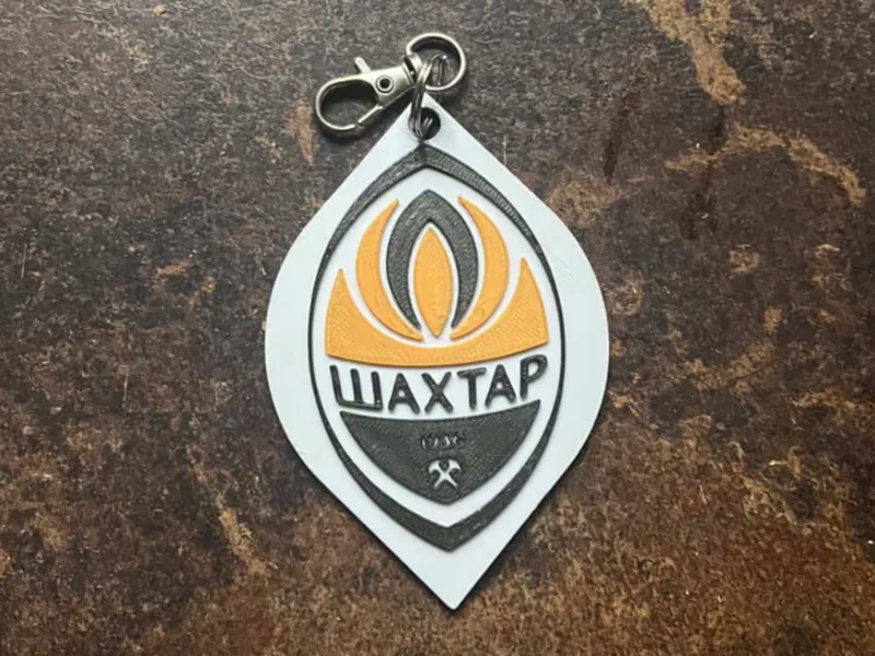 Shakhtar donetsk logo with hole for keyring
