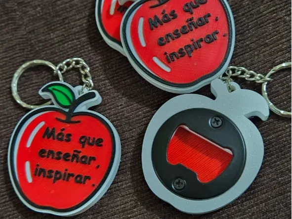 Llavro y destapador de botellas de manzana