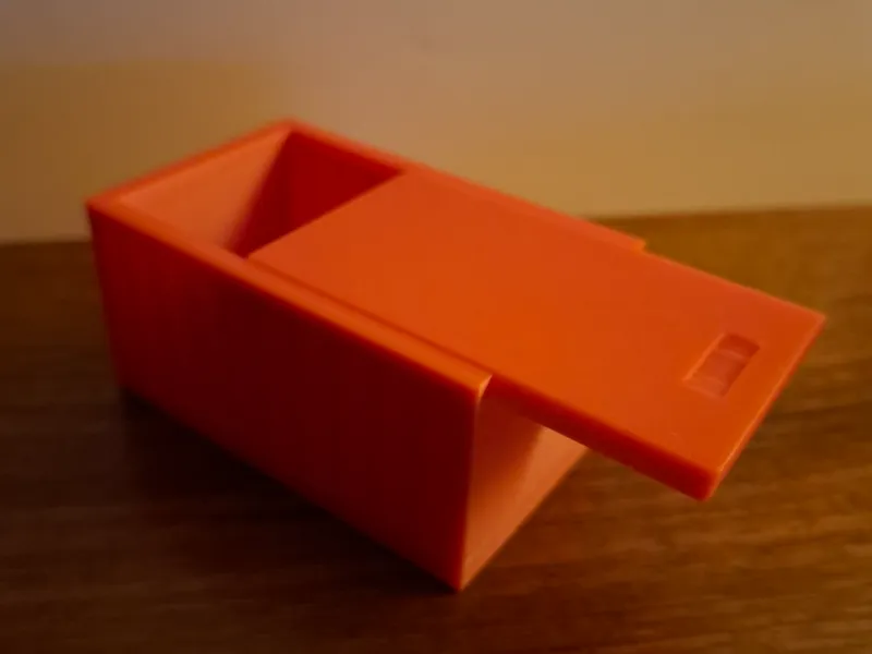 Box with sliding lid