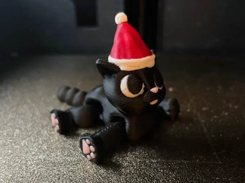 Bewegliche Weihnachtskatze 