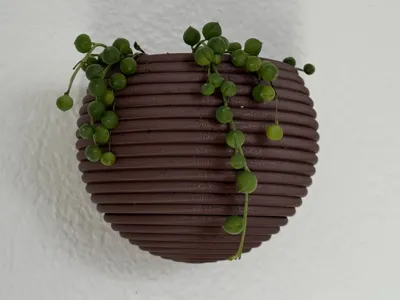 Wall planter with hidden drip tray - Free 3D Print Model - MakerWorld