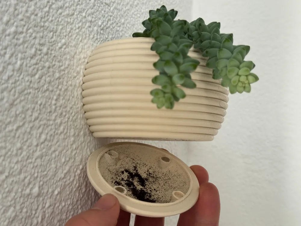 Wall planter with hidden drip tray - Free 3D Print Model - MakerWorld
