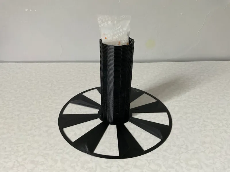 Dual spool stand with dessicant hole vase mode