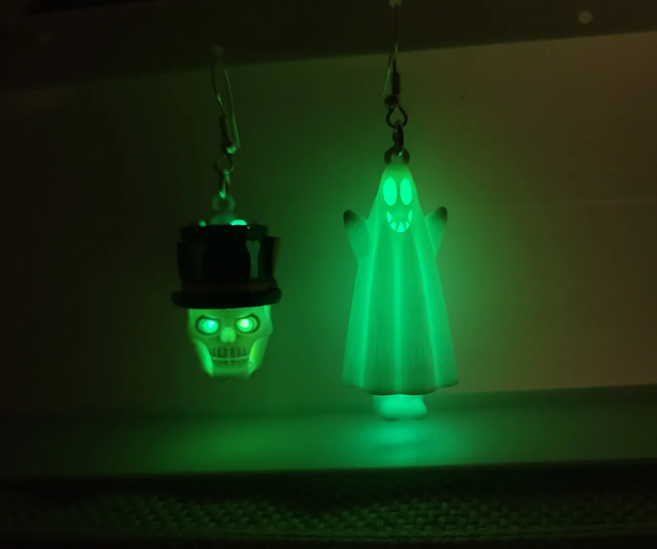 glowing ghost and skull earrings using glow sticks view 3