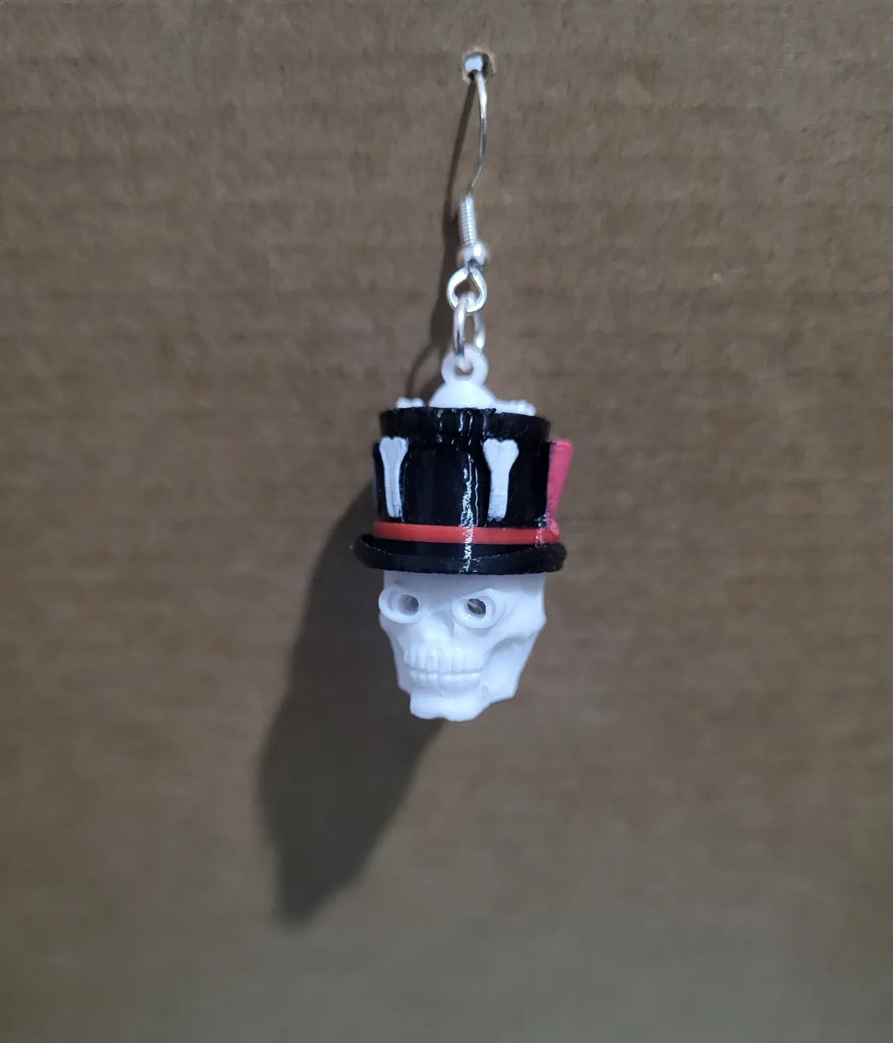 glowing ghost and skull earrings using glow sticks view 4
