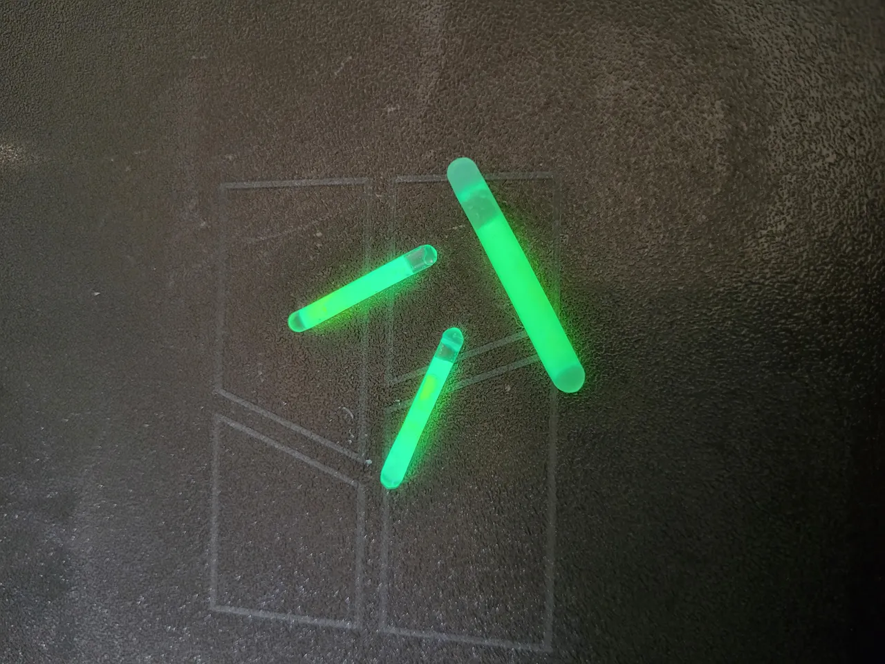 glowing ghost and skull earrings using glow sticks view 2
