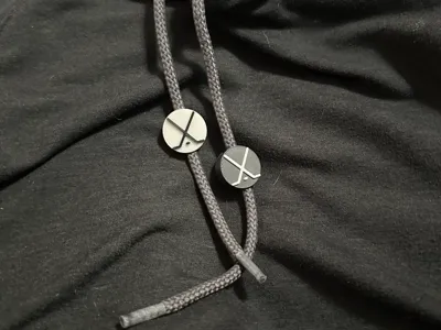 Hockey Puck with Crossing Sticks Drawsting Bead