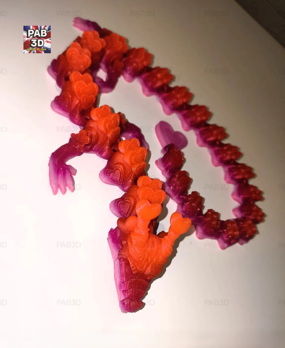 Articulated flexi dragon hearts V2 - Free 3D Print Model - MakerWorld