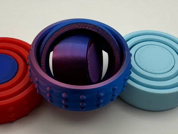 Gyroscope fidget à roulement central