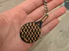 Keychain with text on one side