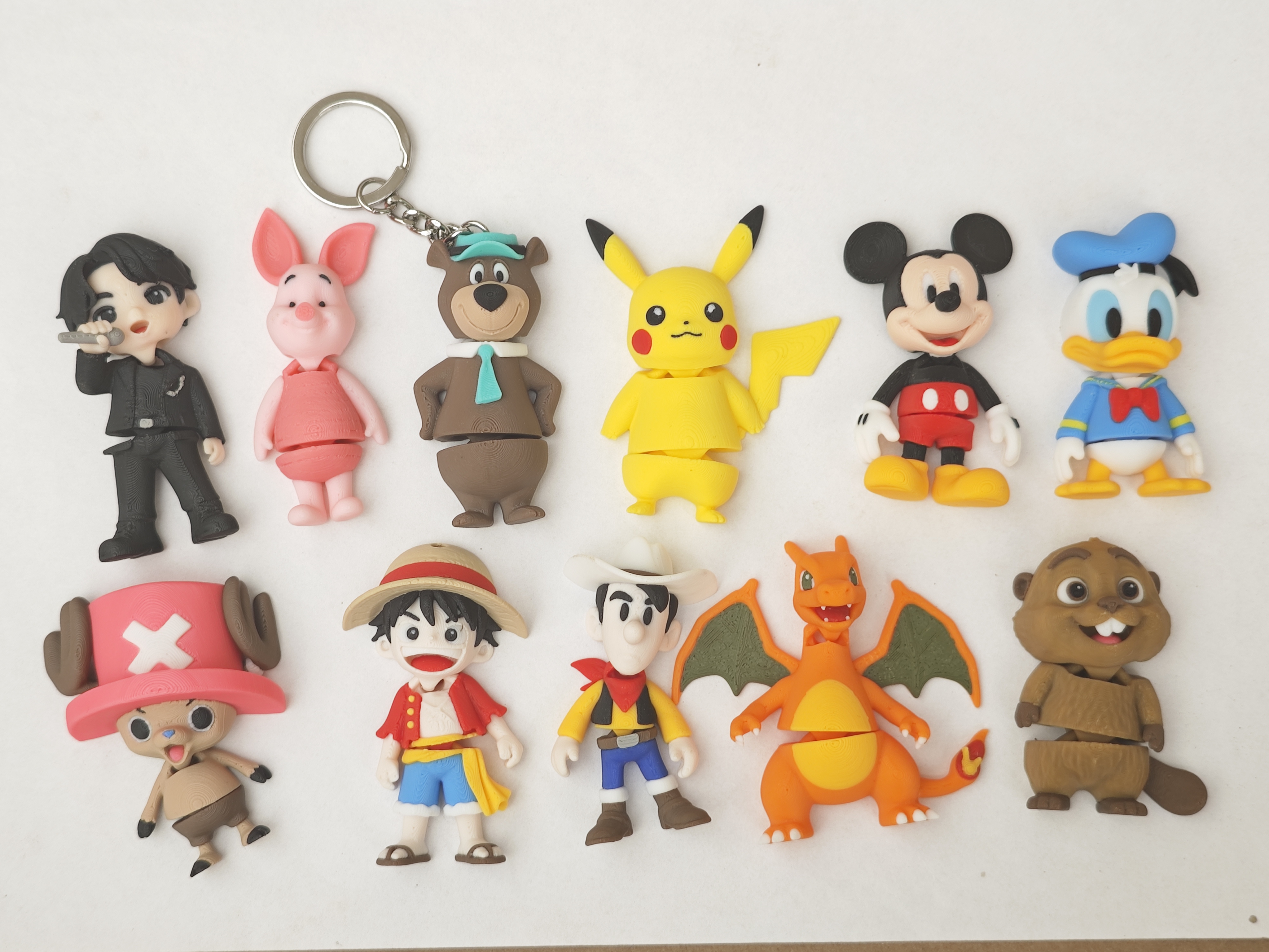 3Dプリント リザードン ミニフレキシキーホルダー (ポケモン) - 無料3D