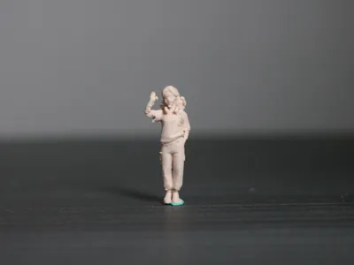 1/64 scale woman saluting figurine