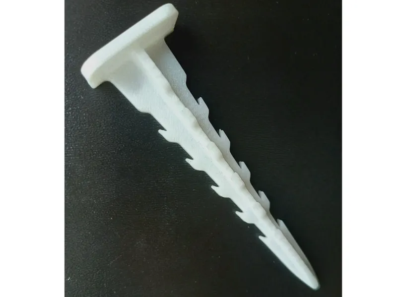 White garden stake anchor weed barrier curb