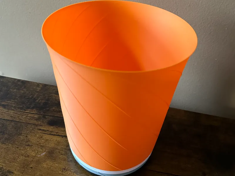 Garbage bin designed to use canadian milk bag