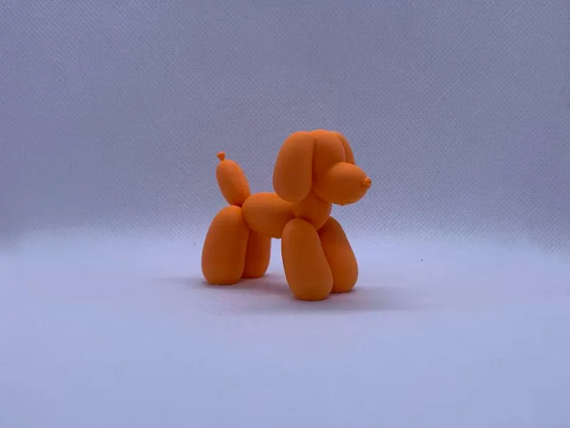 Joyful Balloon Dog: Cute Desktop Figurine