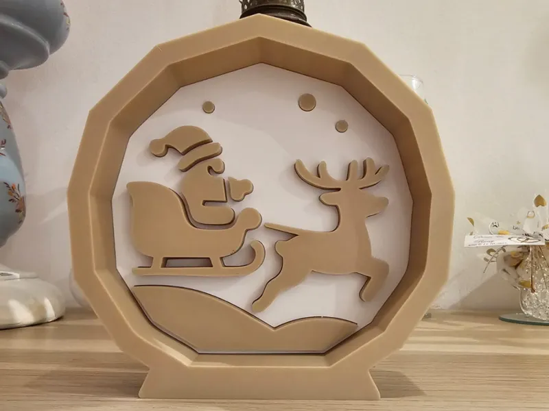 décoration de noël, père noël tiré par son renne 