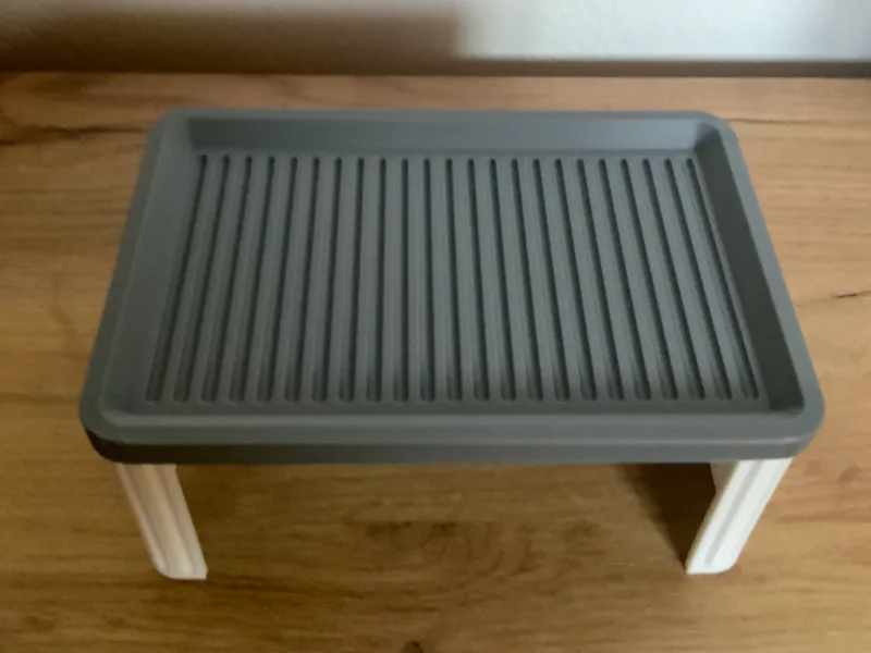 Raised desk tray