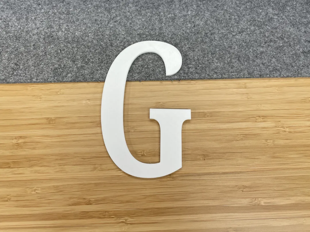 Lettre décorative G