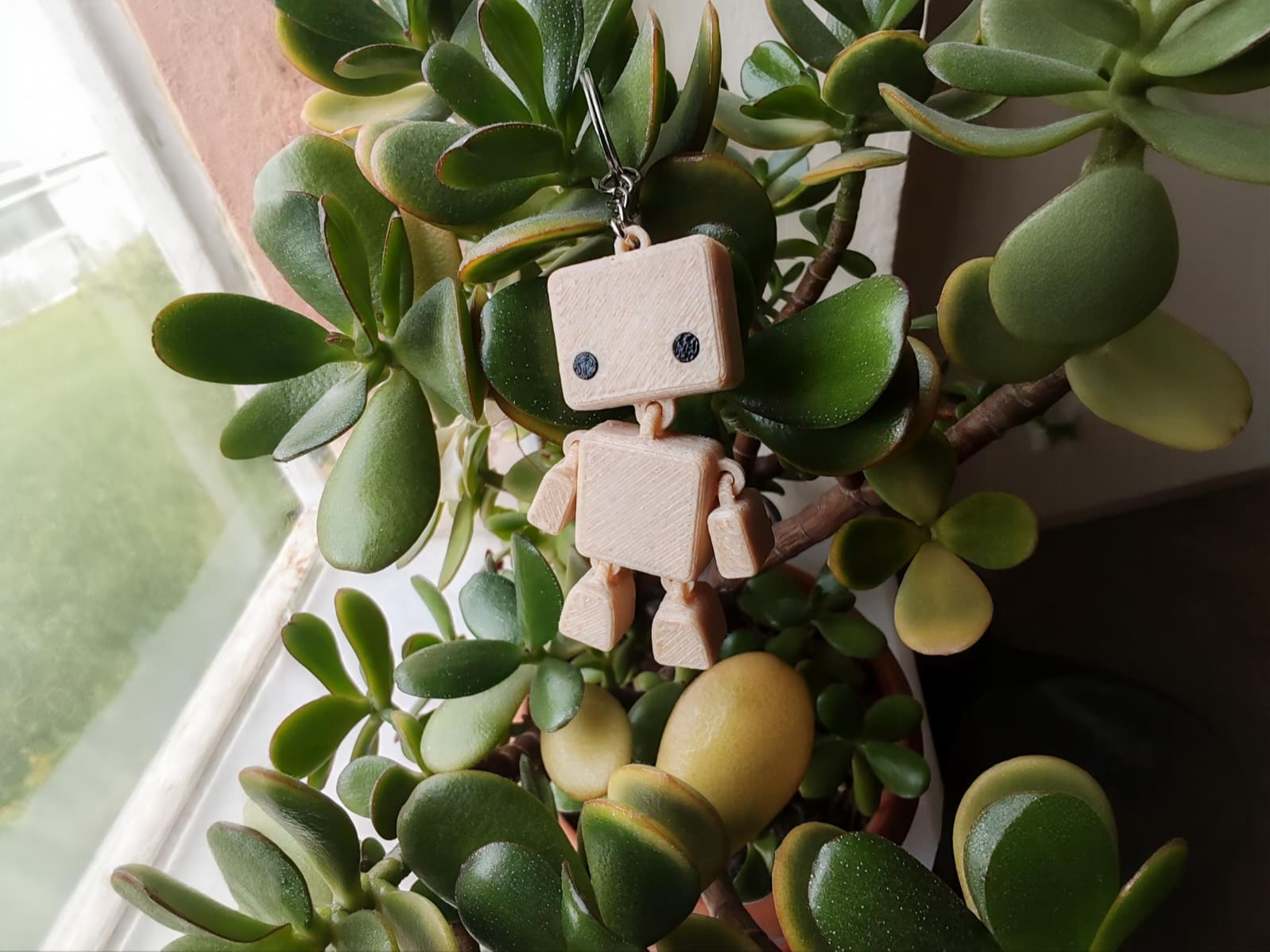 Tiny Flexi Bot Keychain 