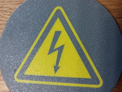 High voltage cup coaster