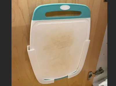 Low-Profile Cabinet Door Cutting Board Holder 