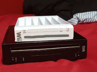 Wii shaped game holder for the wii