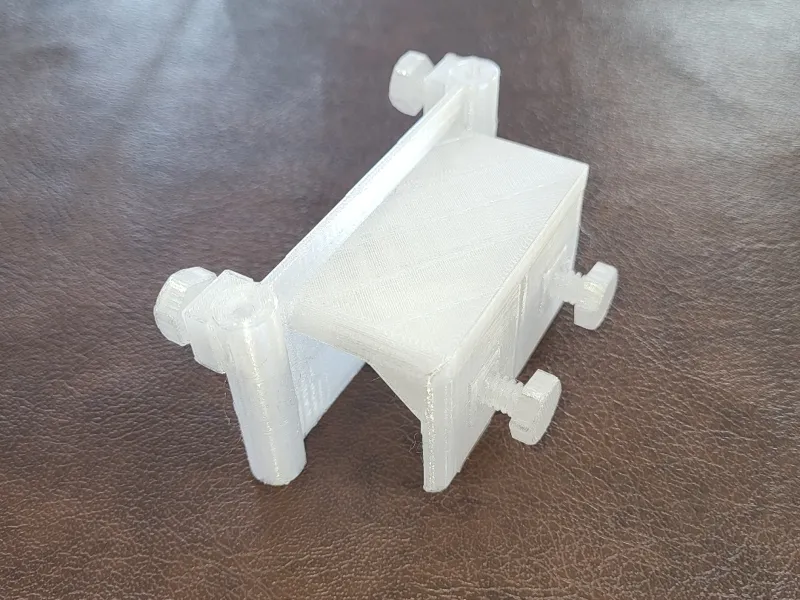 bracket for adding a light to rimmed aquarium
