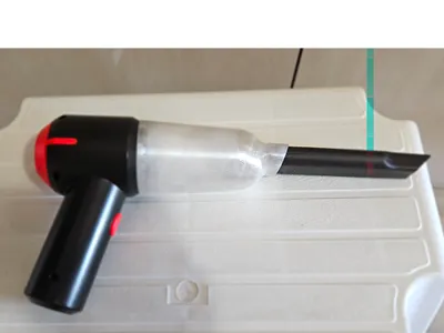 Dust trap for portable automatic vacuum cleaner