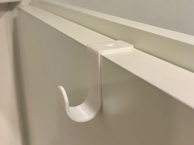 Hidden coat hook for the inside of a room door