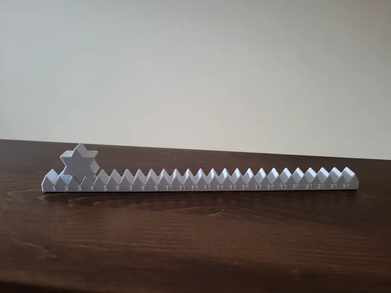 Adventskalender mit Stern-Schiebemechanismus