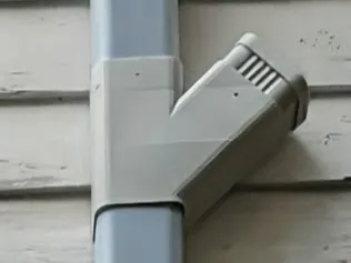 3 by 4 downspout tee and line set cover junction