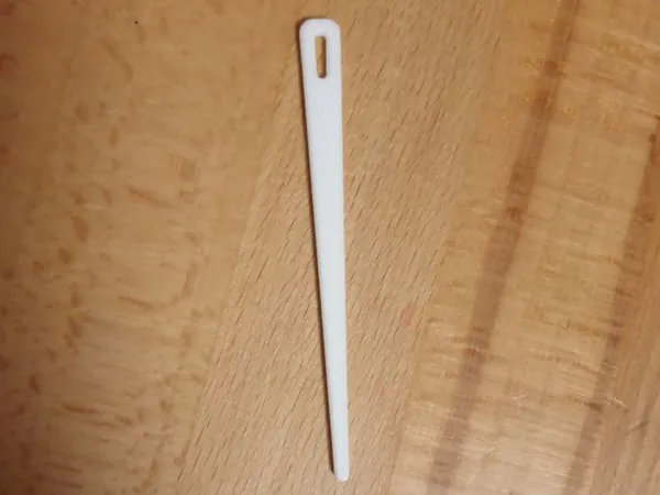Aiguille de tirage de cordon